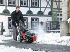 Tielburger in actie met sneeuwschuif